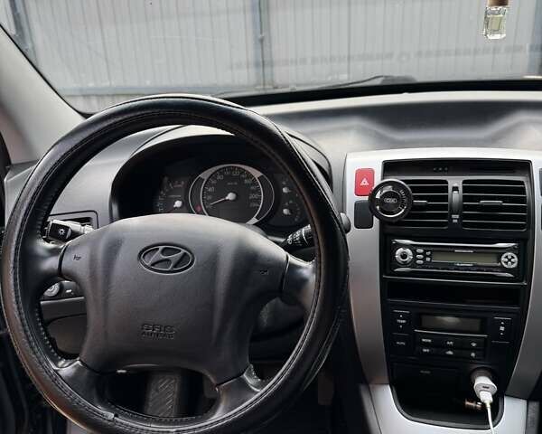 Чорний Хендай Туксон, об'ємом двигуна 1.98 л та пробігом 178 тис. км за 8500 $, фото 23 на Automoto.ua