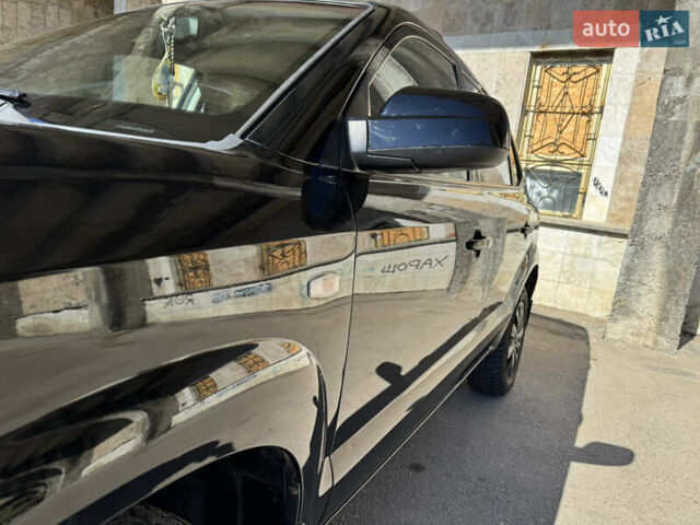 Черный Хендай Туксон, объемом двигателя 2 л и пробегом 189 тыс. км за 8250 $, фото 2 на Automoto.ua