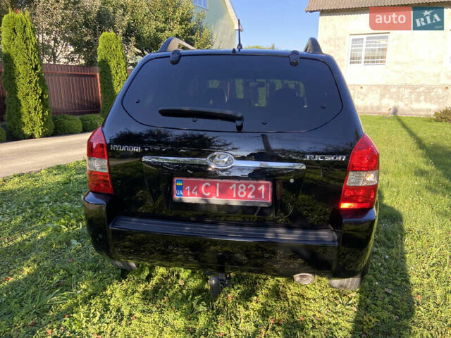 Черный Хендай Туксон, объемом двигателя 1.98 л и пробегом 197 тыс. км за 8000 $, фото 20 на Automoto.ua