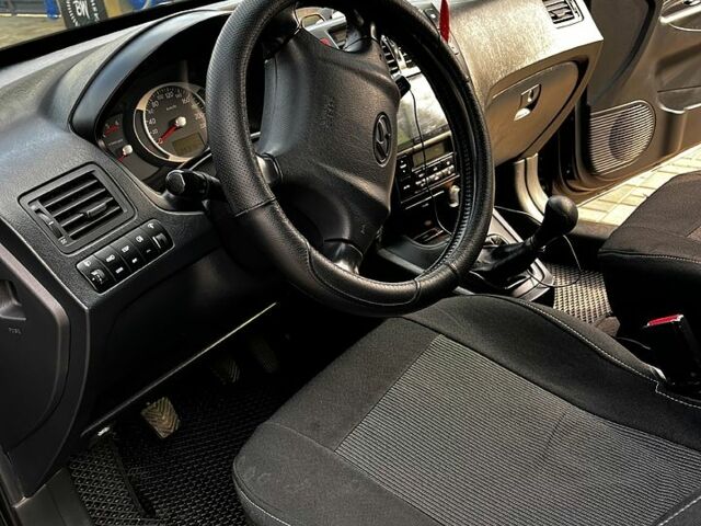 Чорний Хендай Туксон, об'ємом двигуна 2 л та пробігом 240 тис. км за 8600 $, фото 7 на Automoto.ua