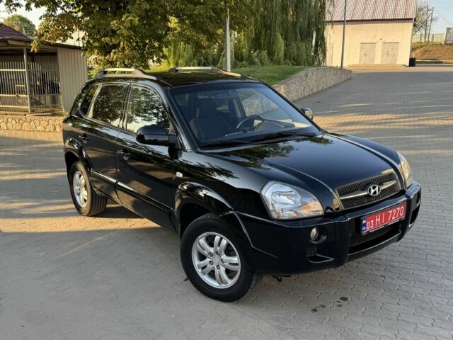 Черный Хендай Туксон, объемом двигателя 2 л и пробегом 180 тыс. км за 7800 $, фото 1 на Automoto.ua