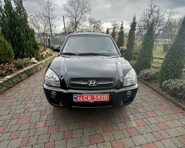 Черный Хендай Туксон, объемом двигателя 2 л и пробегом 218 тыс. км за 7600 $, фото 8 на Automoto.ua