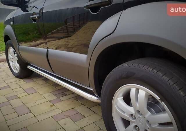 Чорний Хендай Туксон, об'ємом двигуна 2 л та пробігом 229 тис. км за 8600 $, фото 83 на Automoto.ua