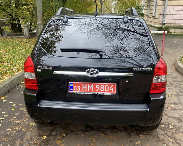 Черный Хендай Туксон, объемом двигателя 2 л и пробегом 178 тыс. км за 7860 $, фото 12 на Automoto.ua