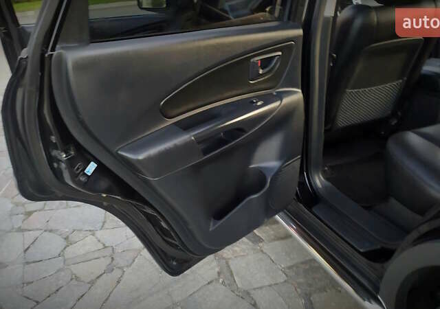 Черный Хендай Туксон, объемом двигателя 2 л и пробегом 230 тыс. км за 8600 $, фото 189 на Automoto.ua