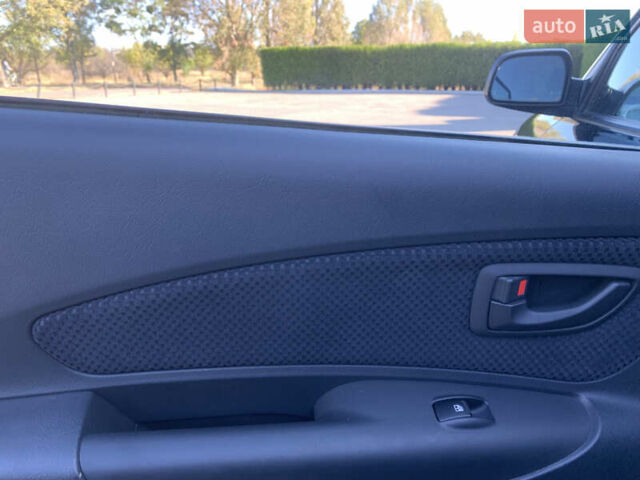Чорний Хендай Туксон, об'ємом двигуна 2 л та пробігом 56 тис. км за 9500 $, фото 16 на Automoto.ua