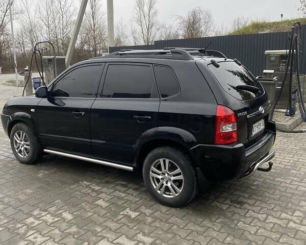 Чорний Хендай Туксон, об'ємом двигуна 1.99 л та пробігом 345 тис. км за 7600 $, фото 1 на Automoto.ua