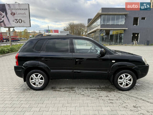 Черный Хендай Туксон, объемом двигателя 2 л и пробегом 182 тыс. км за 6999 $, фото 6 на Automoto.ua
