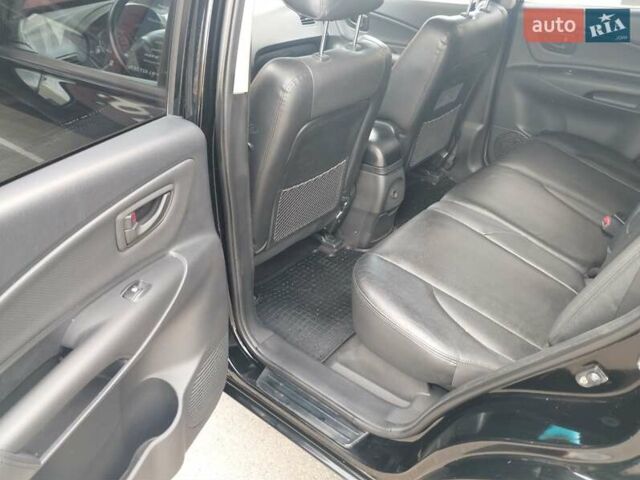 Чорний Хендай Туксон, об'ємом двигуна 1.98 л та пробігом 203 тис. км за 8500 $, фото 8 на Automoto.ua