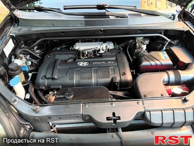 Черный Хендай Туксон, объемом двигателя 2 л и пробегом 270 тыс. км за 7400 $, фото 9 на Automoto.ua