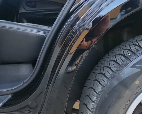 Чорний Хендай Туксон, об'ємом двигуна 1.98 л та пробігом 192 тис. км за 7950 $, фото 22 на Automoto.ua