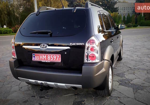 Черный Хендай Туксон, объемом двигателя 2 л и пробегом 230 тыс. км за 8600 $, фото 41 на Automoto.ua