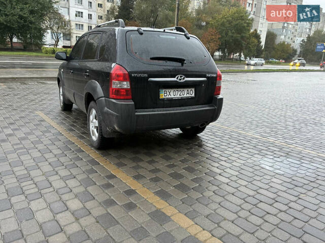 Черный Хендай Туксон, объемом двигателя 2 л и пробегом 176 тыс. км за 7450 $, фото 4 на Automoto.ua
