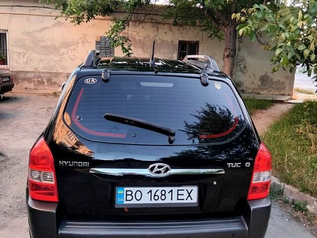 Черный Хендай Туксон, объемом двигателя 2 л и пробегом 270 тыс. км за 7400 $, фото 3 на Automoto.ua