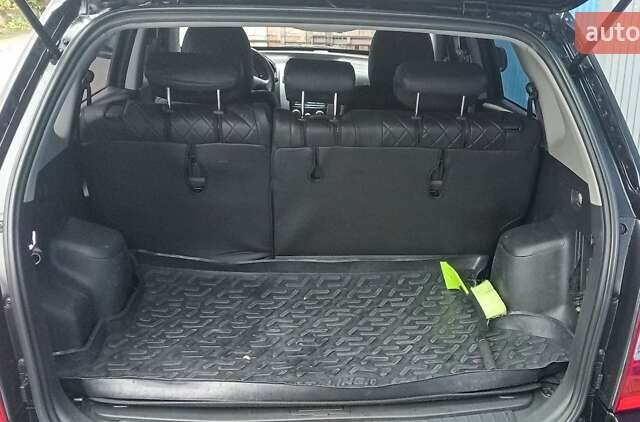 Чорний Хендай Туксон, об'ємом двигуна 2 л та пробігом 308 тис. км за 7555 $, фото 8 на Automoto.ua