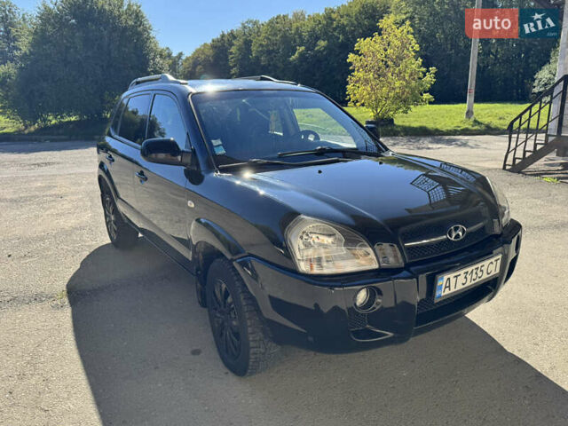 Черный Хендай Туксон, объемом двигателя 2 л и пробегом 189 тыс. км за 8250 $, фото 1 на Automoto.ua