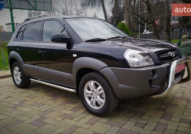 Чорний Хендай Туксон, об'ємом двигуна 2 л та пробігом 229 тис. км за 8600 $, фото 20 на Automoto.ua