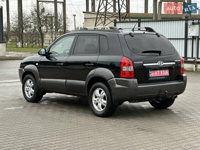 Чорний Хендай Туксон, об'ємом двигуна 2 л та пробігом 230 тис. км за 6850 $, фото 6 на Automoto.ua