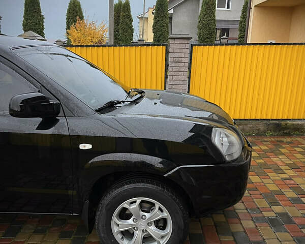 Черный Хендай Туксон, объемом двигателя 2 л и пробегом 151 тыс. км за 9100 $, фото 4 на Automoto.ua