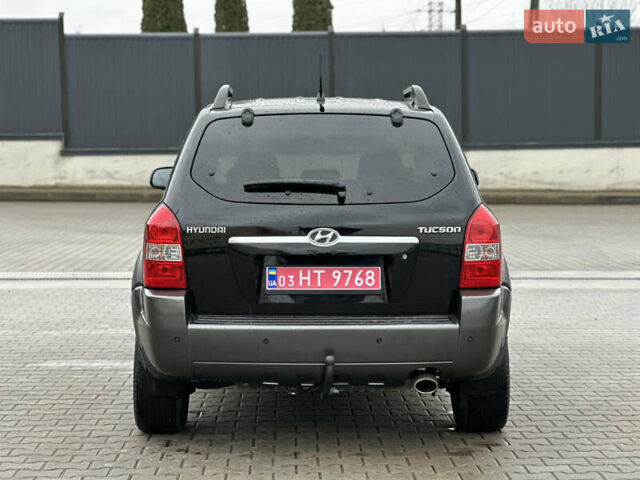 Чорний Хендай Туксон, об'ємом двигуна 2 л та пробігом 230 тис. км за 6850 $, фото 7 на Automoto.ua