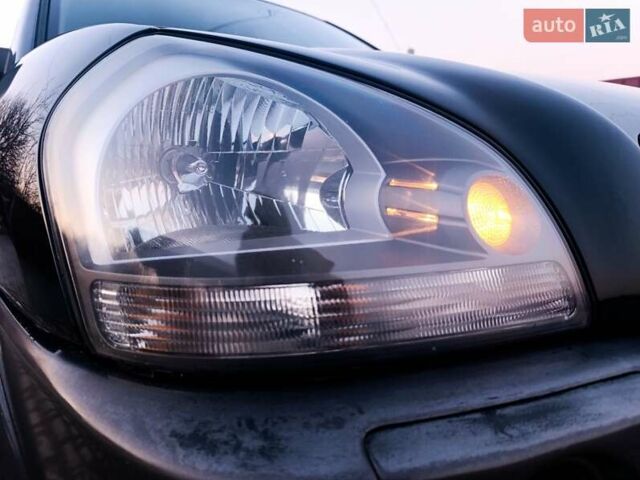 Черный Хендай Туксон, объемом двигателя 2 л и пробегом 280 тыс. км за 9500 $, фото 8 на Automoto.ua