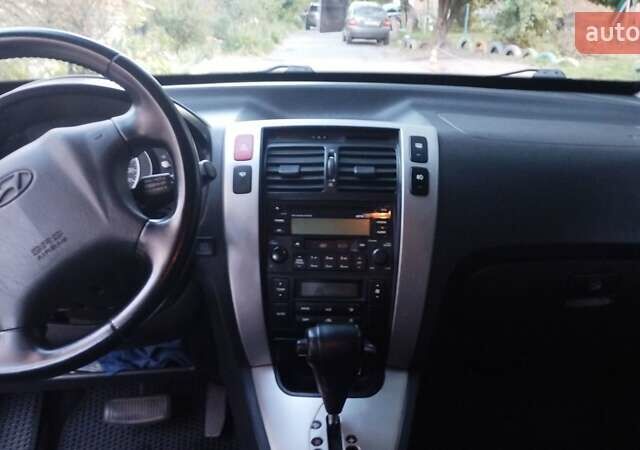 Хендай Туксон 2007 у Лубнах на Automoto.ua Чорний Хендай Туксон, об'ємом двигуна 1.98 л та пробігом 213 тис. км за 8500 $, фото 2 на Automoto.ua