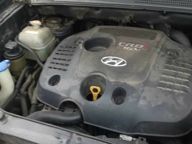 Черный Хендай Туксон, объемом двигателя 2 л и пробегом 200 тыс. км за 8300 $, фото 12 на Automoto.ua