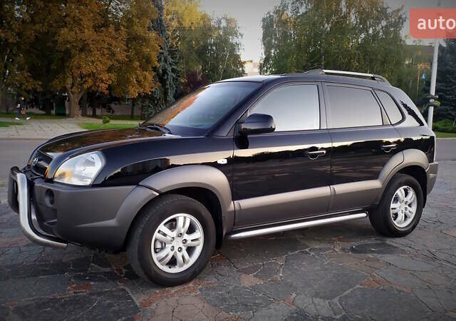 Черный Хендай Туксон, объемом двигателя 2 л и пробегом 230 тыс. км за 8600 $, фото 97 на Automoto.ua