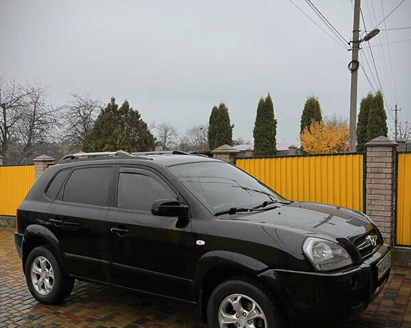 Черный Хендай Туксон, объемом двигателя 2 л и пробегом 151 тыс. км за 9100 $, фото 5 на Automoto.ua
