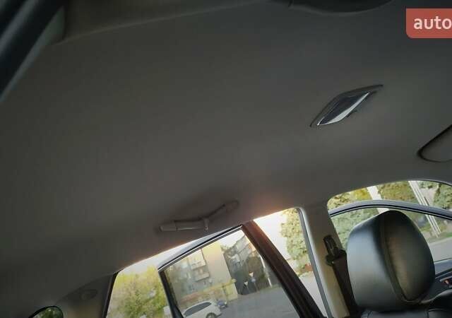 Черный Хендай Туксон, объемом двигателя 2 л и пробегом 230 тыс. км за 8600 $, фото 186 на Automoto.ua