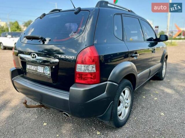 Черный Хендай Туксон, объемом двигателя 2 л и пробегом 227 тыс. км за 8200 $, фото 30 на Automoto.ua