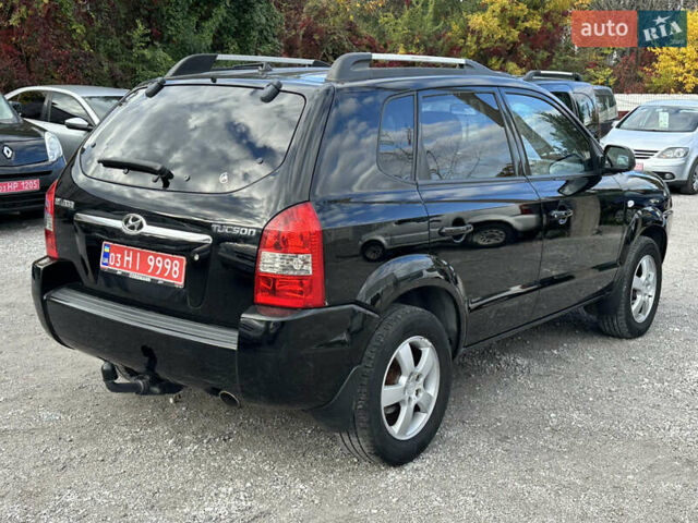 Чорний Хендай Туксон, об'ємом двигуна 2 л та пробігом 180 тис. км за 7999 $, фото 4 на Automoto.ua