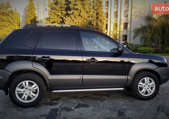 Черный Хендай Туксон, объемом двигателя 2 л и пробегом 230 тыс. км за 8600 $, фото 36 на Automoto.ua