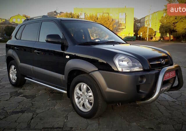 Черный Хендай Туксон, объемом двигателя 2 л и пробегом 230 тыс. км за 8600 $, фото 32 на Automoto.ua