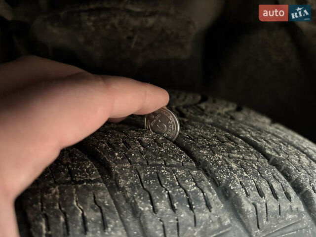 Черный Хендай Туксон, объемом двигателя 1.99 л и пробегом 266 тыс. км за 7500 $, фото 12 на Automoto.ua