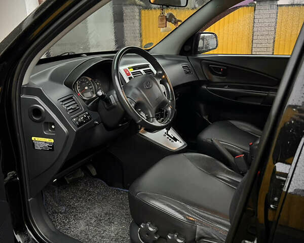 Черный Хендай Туксон, объемом двигателя 2 л и пробегом 151 тыс. км за 9100 $, фото 11 на Automoto.ua