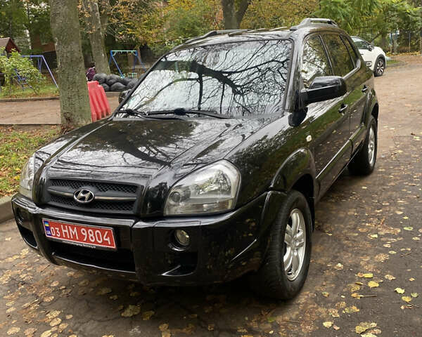 Черный Хендай Туксон, объемом двигателя 2 л и пробегом 178 тыс. км за 7860 $, фото 2 на Automoto.ua