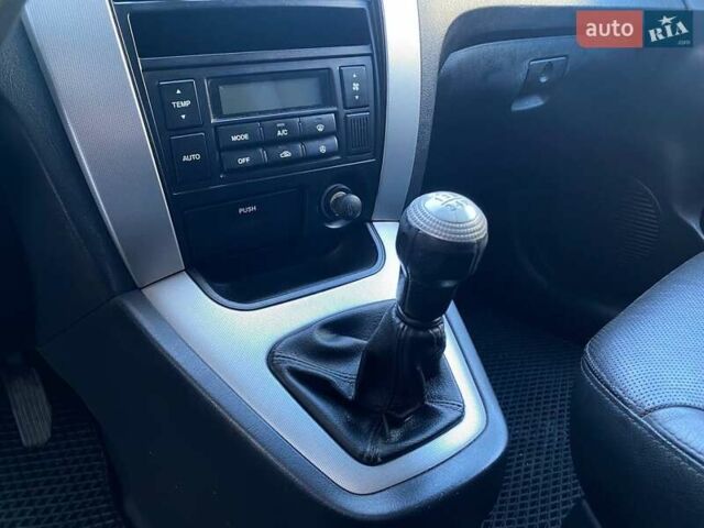 Черный Хендай Туксон, объемом двигателя 1.98 л и пробегом 286 тыс. км за 7300 $, фото 15 на Automoto.ua