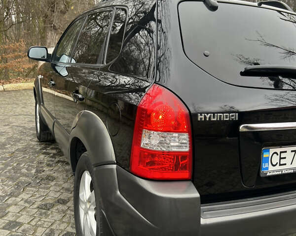 Чорний Хендай Туксон, об'ємом двигуна 1.98 л та пробігом 155 тис. км за 8750 $, фото 5 на Automoto.ua