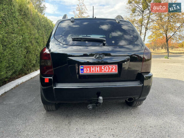 Черный Хендай Туксон, объемом двигателя 2 л и пробегом 256 тыс. км за 7800 $, фото 8 на Automoto.ua