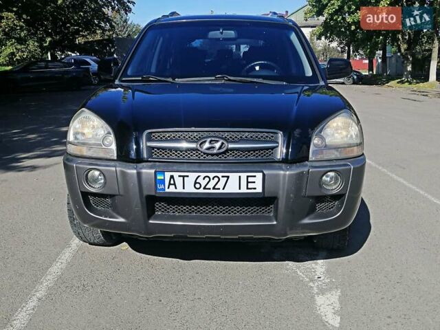 Черный Хендай Туксон, объемом двигателя 2 л и пробегом 270 тыс. км за 10250 $, фото 12 на Automoto.ua