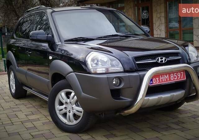 Чорний Хендай Туксон, об'ємом двигуна 2 л та пробігом 229 тис. км за 8600 $, фото 11 на Automoto.ua