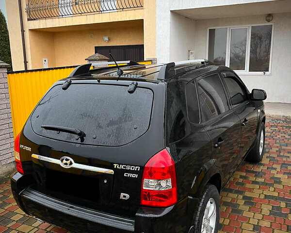 Черный Хендай Туксон, объемом двигателя 2 л и пробегом 151 тыс. км за 9100 $, фото 39 на Automoto.ua