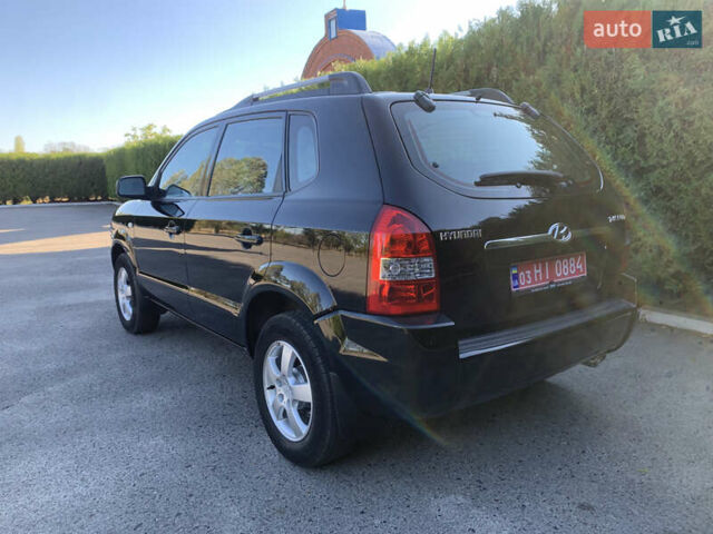 Чорний Хендай Туксон, об'ємом двигуна 2 л та пробігом 56 тис. км за 9500 $, фото 7 на Automoto.ua