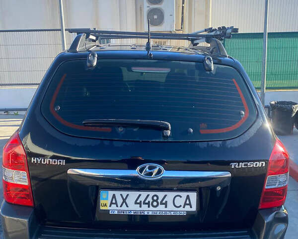 Чорний Хендай Туксон, об'ємом двигуна 1.98 л та пробігом 215 тис. км за 7540 $, фото 13 на Automoto.ua