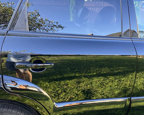 Черный Хендай Туксон, объемом двигателя 1.98 л и пробегом 197 тыс. км за 8000 $, фото 11 на Automoto.ua