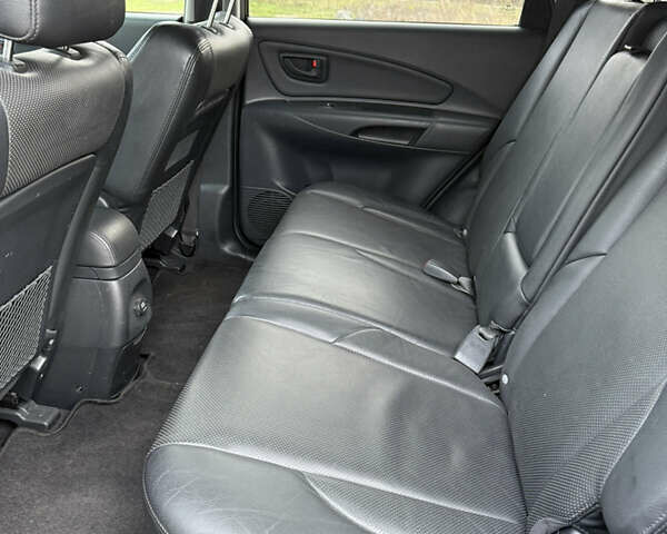 Черный Хендай Туксон, объемом двигателя 1.98 л и пробегом 159 тыс. км за 7600 $, фото 20 на Automoto.ua