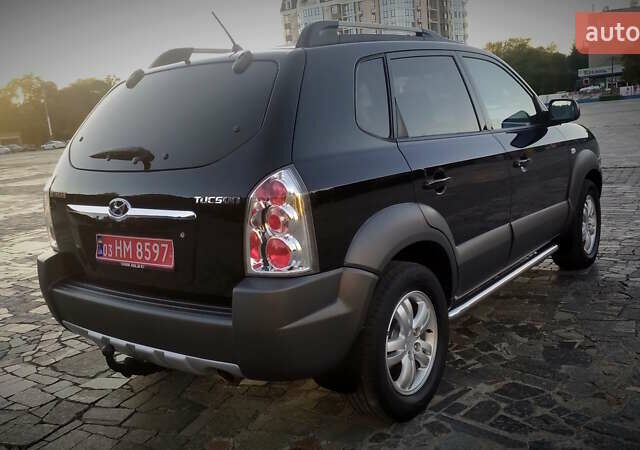 Черный Хендай Туксон, объемом двигателя 2 л и пробегом 230 тыс. км за 8600 $, фото 19 на Automoto.ua