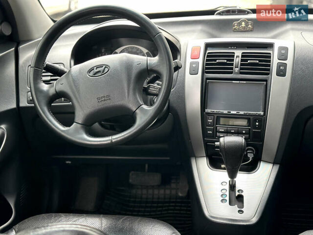 Чорний Хендай Туксон, об'ємом двигуна 2.66 л та пробігом 145 тис. км за 8900 $, фото 14 на Automoto.ua