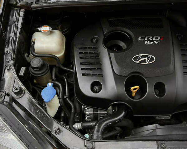 Черный Хендай Туксон, объемом двигателя 2 л и пробегом 151 тыс. км за 9100 $, фото 29 на Automoto.ua